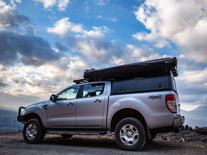 Hardtop Alu-Cab Explorer 3 en aluminium pour Mitsubishi L200 2016+ avec fenêtre et fixation robuste.