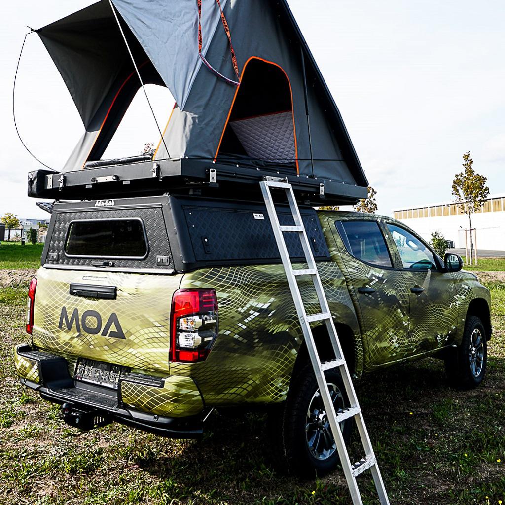 Hardtop Alu-Cab Explorer 3 en aluminium pour Mitsubishi L200 2016+, vue de côté avec fenêtres et porte latérale.