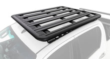 Galerie Pioneer 6 RHINO-RACK vue du dessus sur Toyota Hilux REVO, photo illustrative