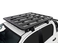 Galerie RHINO-RACK Pioneer 6 sur Toyota Hilux vue de trois quarts en hauteur