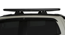 Kit galerie de toit Rhino-Rack Pioneer 6 1500x1240mm avec pieds RCL, cadre en acier robuste et fixation sur véhicule.